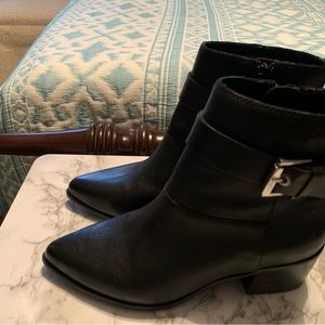 Black Booties Sz 7.5
ALDO-  Bootie with stylish silver buckle very versatile.